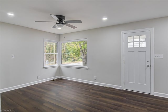 entrance foyer with dark hardwood / wood-style floors and ceiling fan