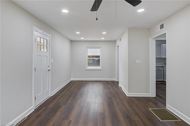 foyer featuring dark hardwood / wood-style floors and ceiling fan