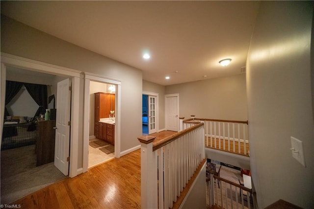 hallway with light wood-type flooring