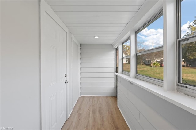 hallway featuring light hardwood / wood-style flooring