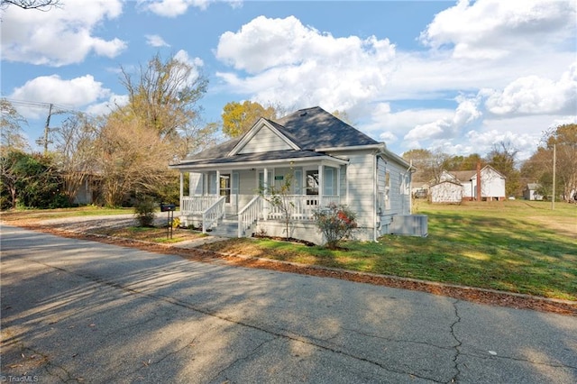 bungalow-style house featuring a front yard and a porch