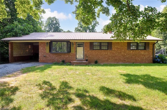 480 NC Highway 150, Lexington, NC 27295 - single story home featuring a front lawn, gravel driveway, a carport, and brick siding