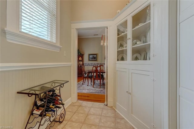 521 Patrick St, Eden, NC 27288 - entryway with a wainscoted wall, light tile patterned flooring, and ornamental molding