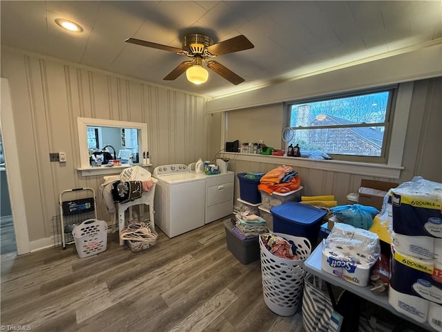 washroom with hardwood / wood-style flooring, washer and clothes dryer, and ceiling fan