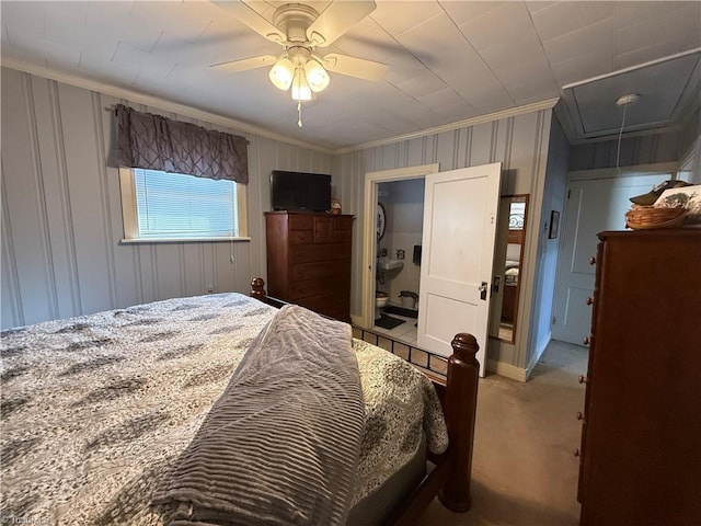 bedroom with crown molding, carpet, and ceiling fan