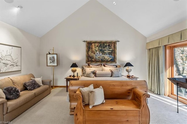 carpeted bedroom featuring access to exterior, multiple windows, and high vaulted ceiling