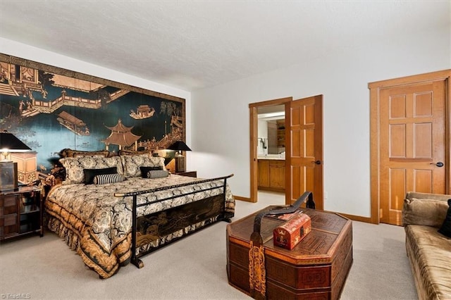 bedroom with baseboards, a textured ceiling, and carpet flooring