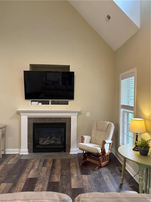 7255 Orchard Path Dr, Clemmons, NC 27012 - living room with wood finished floors, a tile fireplace, baseboards, and high vaulted ceiling