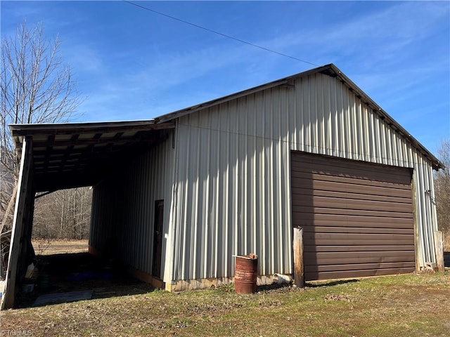 view of outdoor structure with a garage