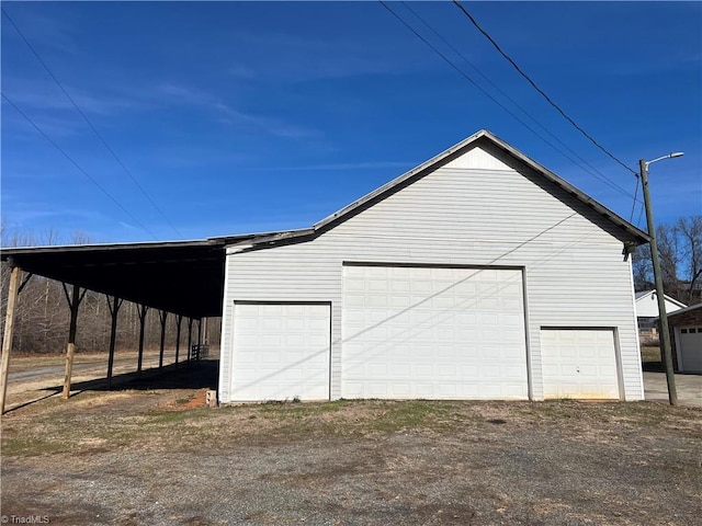 garage with a carport