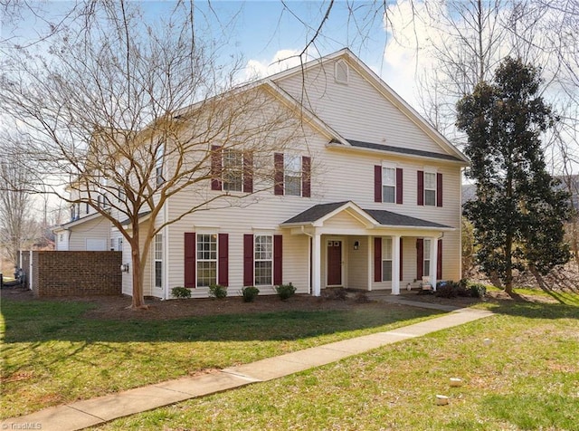 view of front of home featuring a front yard