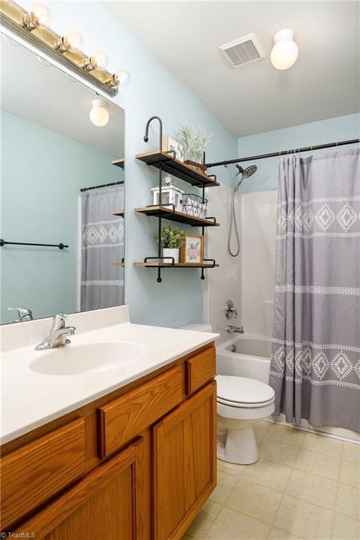 bathroom featuring visible vents, shower / bathtub combination with curtain, toilet, and vanity