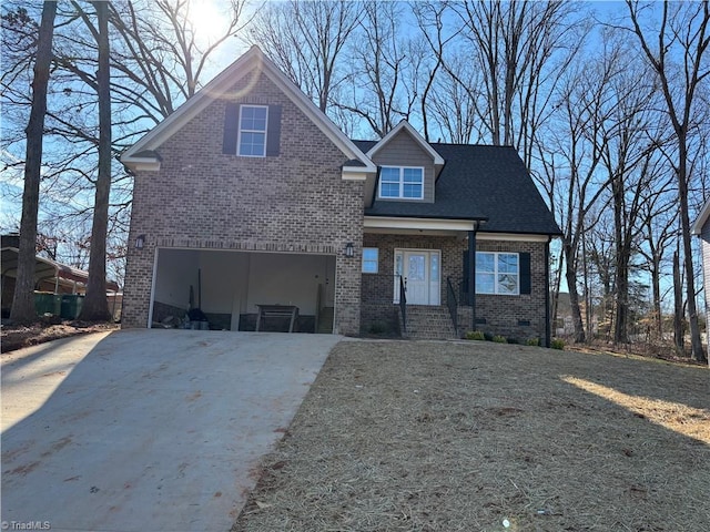 view of front of property with a garage