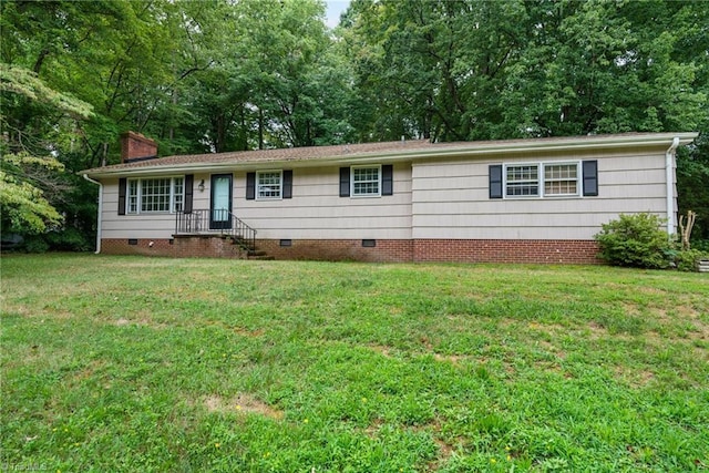 ranch-style home with a front yard