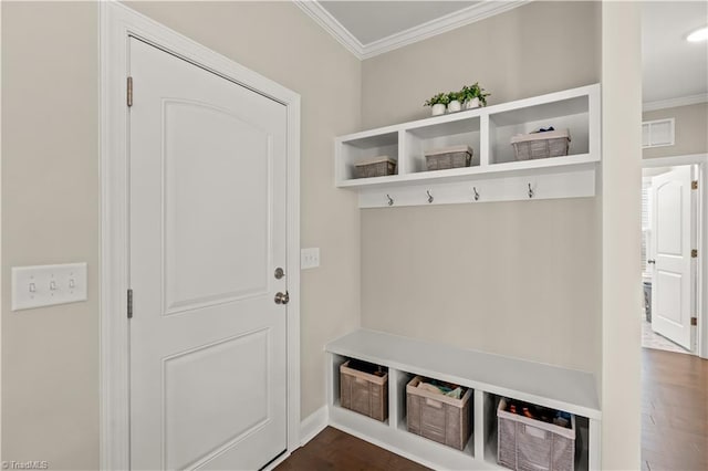 mudroom featuring crown molding and dark wood-type flooring