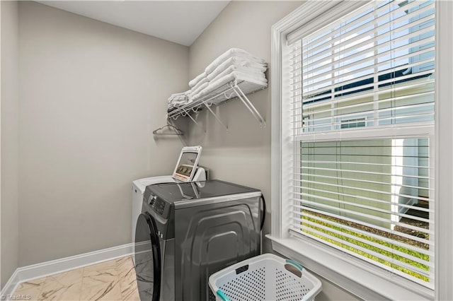 washroom featuring washer and dryer