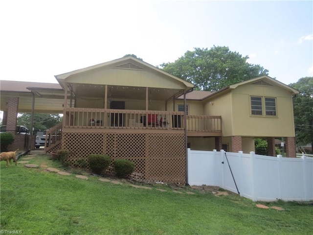rear view of property with brick siding
