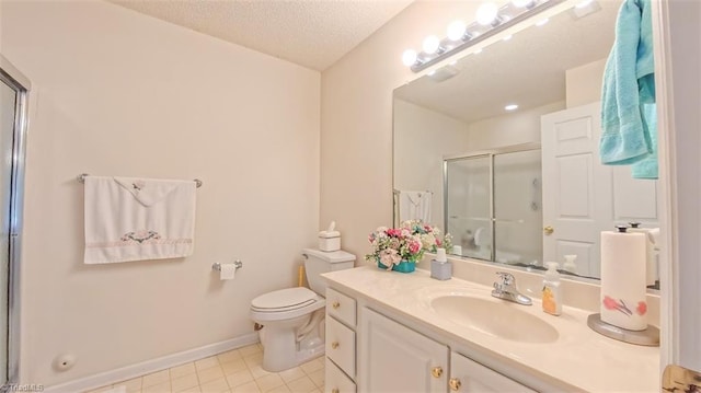 138 Wyndham Ct, High Point, NC 27265 - bathroom featuring a stall shower, toilet, vanity, baseboards, and tile patterned flooring