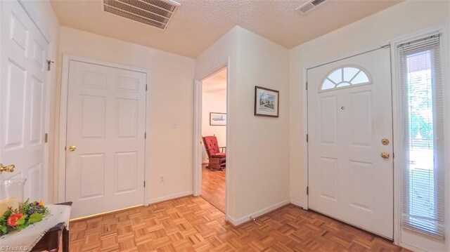 138 Wyndham Ct, High Point, NC 27265 - foyer entrance featuring baseboards