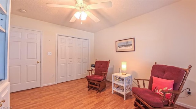 138 Wyndham Ct, High Point, NC 27265 - sitting room featuring light wood-style flooring, ceiling fan, baseboards, and a textured ceiling