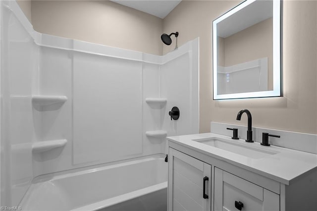 bathroom with vanity and  shower combination