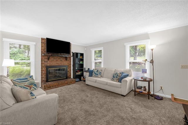 5001 Robert Andrew Rd, Greensboro, NC 27406 - living room featuring carpet floors, a brick fireplace, crown molding, and a textured ceiling