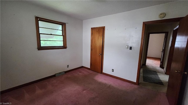 2308 Sprague St, Winston-Salem, NC 27107 - unfurnished bedroom featuring carpet flooring and baseboards