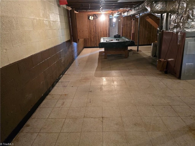 210 Grinton Ave, Wilkesboro, NC 28697 - unfinished below grade area featuring concrete block wall and tile patterned floors