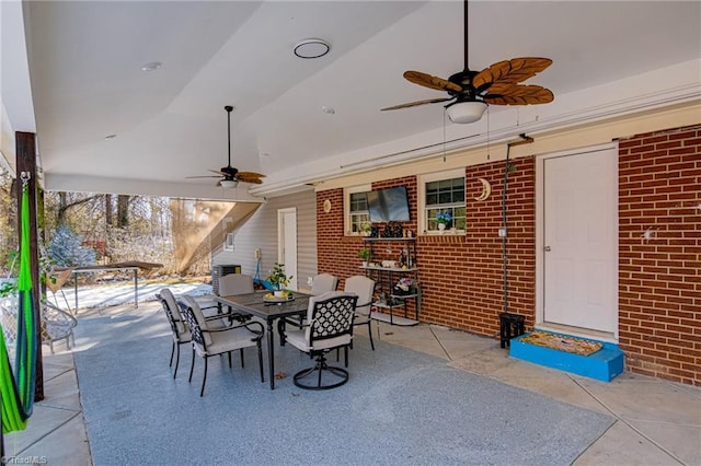 view of patio / terrace featuring a ceiling fan and outdoor dining area