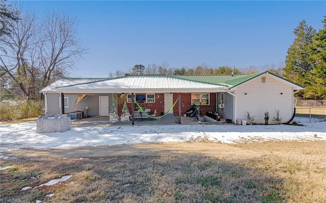 view of front of property with metal roof
