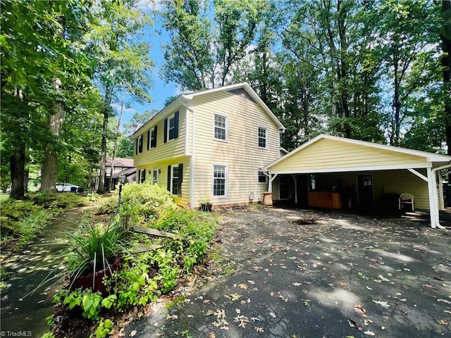 view of front of house featuring a carport