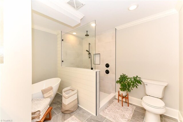 bathroom featuring tile patterned flooring, crown molding, separate shower and tub, and toilet