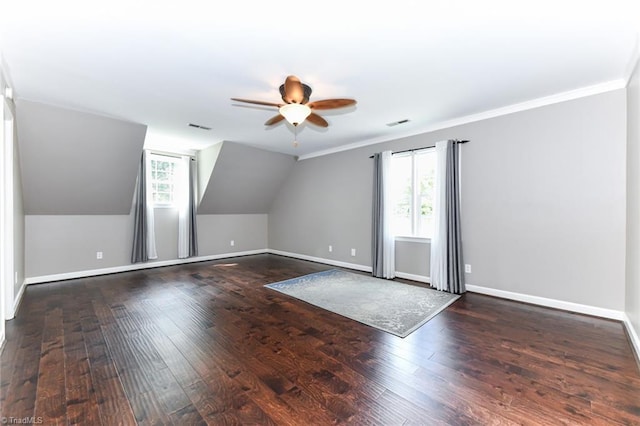 additional living space with dark hardwood / wood-style flooring, ceiling fan, and lofted ceiling