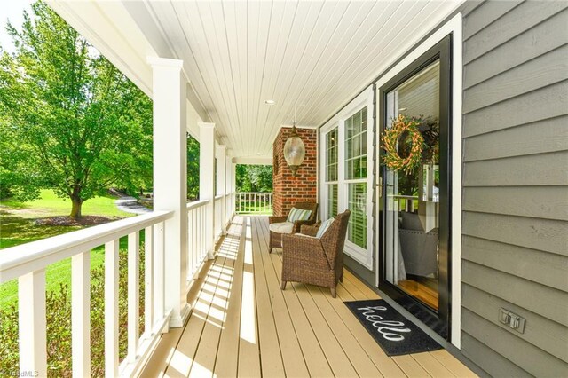 deck with covered porch