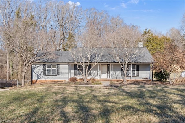 ranch-style house with a front lawn