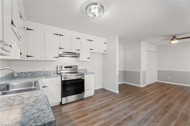 kitchen featuring sink, white cabinetry, dark hardwood / wood-style flooring, electric stove, and ceiling fan