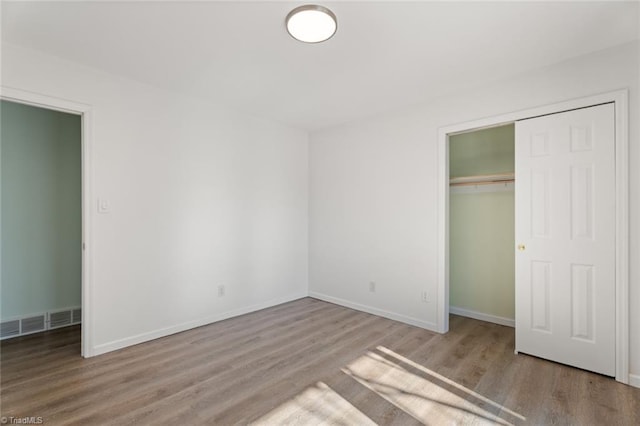 unfurnished bedroom featuring light hardwood / wood-style flooring