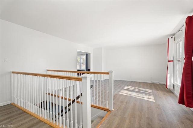 hallway featuring hardwood / wood-style floors