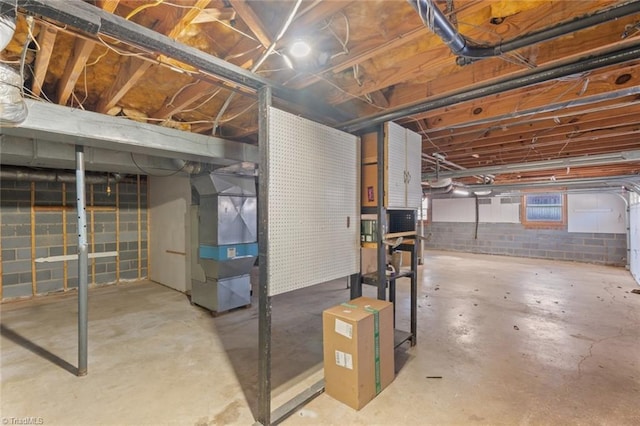 basement featuring heating unit