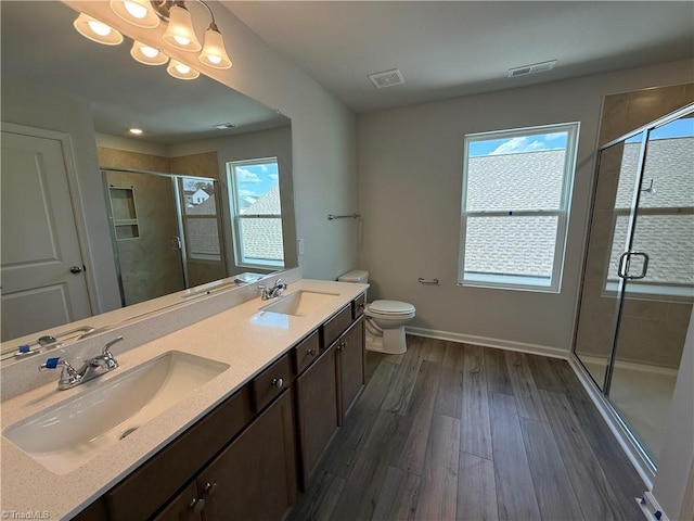 2557 Raspberry Hill Dr, Winston-Salem, NC 27106 - full bath featuring visible vents, a healthy amount of sunlight, and a sink