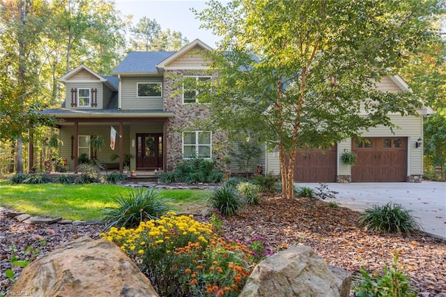 craftsman-style house with a garage and covered porch