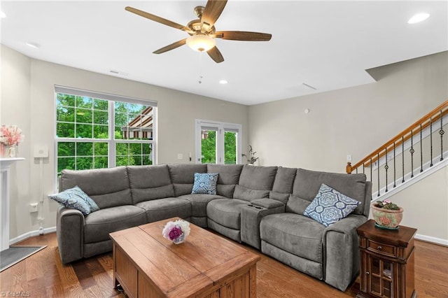 1934 Rubywood St, Greensboro, NC 27405 - living room with ceiling fan, wood finished floors, stairway, baseboards, and recessed lighting