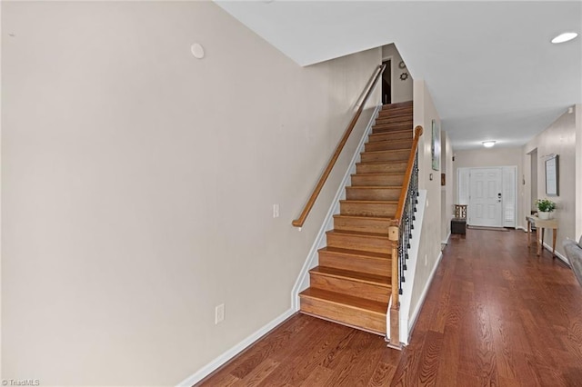 1934 Rubywood St, Greensboro, NC 27405 - staircase featuring baseboards and wood finished floors