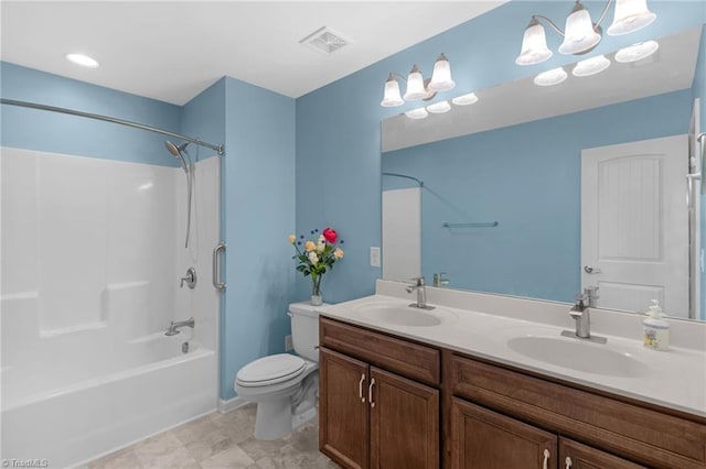 1934 Rubywood St, Greensboro, NC 27405 - bathroom featuring a sink, toilet, double vanity, and visible vents