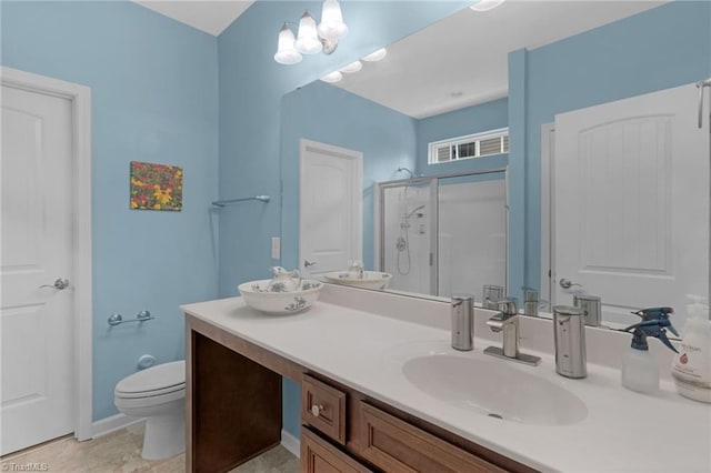 1934 Rubywood St, Greensboro, NC 27405 - full bathroom featuring vanity, toilet, visible vents, and a stall shower