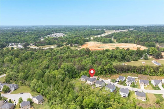 1934 Rubywood St, Greensboro, NC 27405 - drone / aerial view with a wooded view