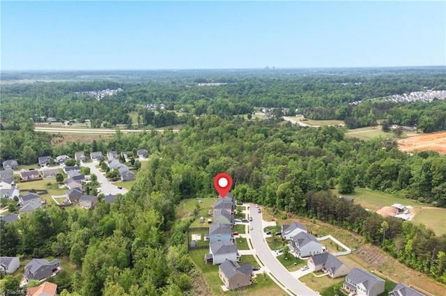 1934 Rubywood St, Greensboro, NC 27405 - birds eye view of property featuring a residential view and a wooded view