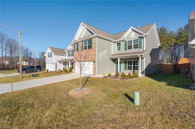 view of front facade featuring a garage and a front lawn