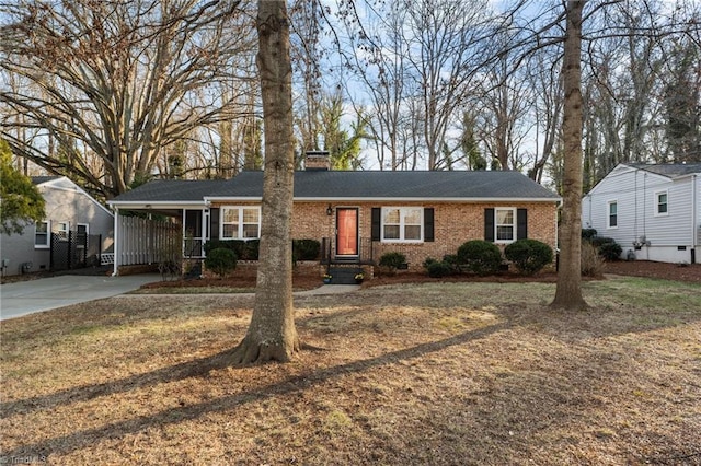 single story home with a carport and a front lawn