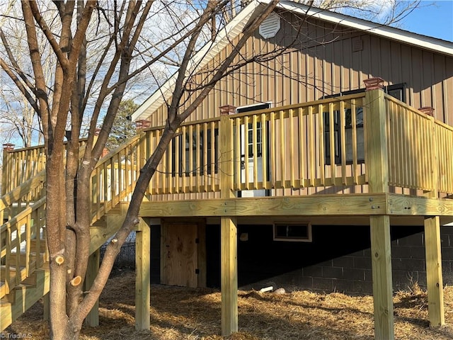 back of house featuring a deck